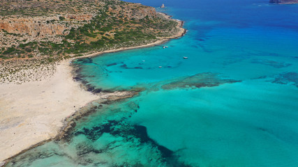 Aerial drone panoramic view of iconic azure turquoise Balos beach lagoon near Gramvousa island and pure white sand, North West Crete island, Greece