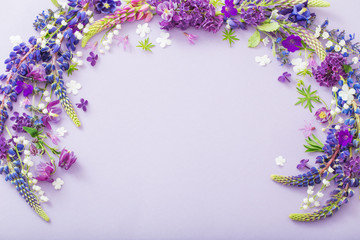 purple, blue, pink flowers on paper background