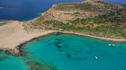 Aerial drone bird's eye view photo of tropical caribbean paradise bay and lagoon with white sandy beach and turquoise clear sea