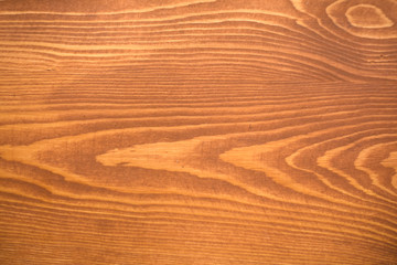 texture of pine table covered with cherry wax background close-up