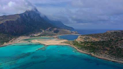 Aerial drone bird's eye view photo of tropical caribbean paradise bay and lagoon with white sandy beach and turquoise clear sea