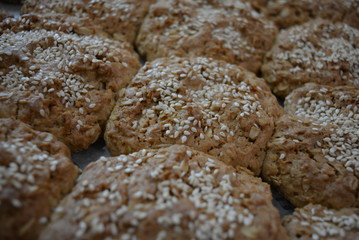 Delicious fresh homemade pastries, home cooking and food. Fragrant homemade songs from the stove. Tasty oatmeal rolls of oatmeal and flour.