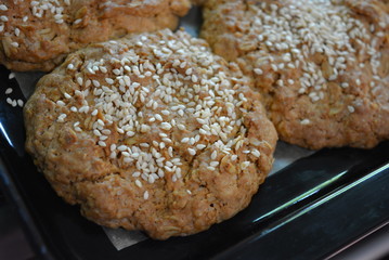 Delicious fresh homemade pastries, home cooking and food. Fragrant homemade songs from the stove. Tasty oatmeal rolls of oatmeal and flour.