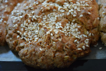 Delicious fresh homemade pastries, home cooking and food. Fragrant homemade songs from the stove. Tasty oatmeal rolls of oatmeal and flour.