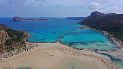 Aerial drone panoramic view of iconic azure turquoise Balos beach lagoon near Gramvousa island and pure white sand, North West Crete island, Greece