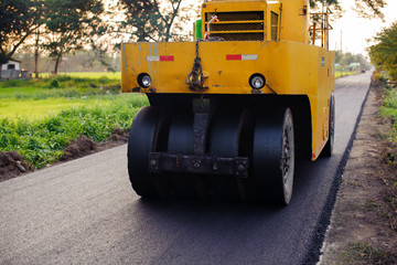 Heavy Vibration roller compactor at asphalt pavement works for road repairing