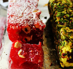 Rahat lakoum. Eastern sweets. Turkish sweets. Several types of Turkish Delight, including hazelnuts and pistachios.