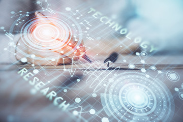 Double exposure of writing hand on background with data technology hologram. Big data concept.