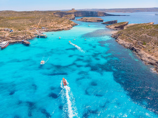 Panorama of Blue Lagoon Comino Malta. Cote Azur, turquoise clear water with white sand. Aerial view