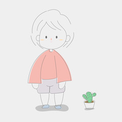 The young cute girl is standing on the floor next to small cactus