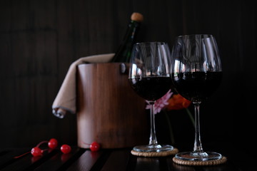 bottle of wine and two glasses on table