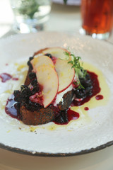 Cream cheese, berries and pear toast