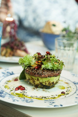 Healthy avo burger with beef and salad