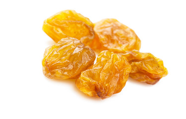 Yellow golden raisins isolated on white background