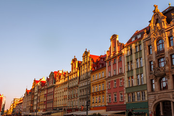 Plakat sunset over old houses in Wroclaw in Poland