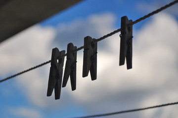 old clothespins on a rope