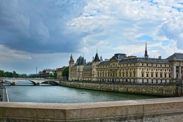 Fototapeta na wymiar Castle Conciergerie - former royal palace and prison. Conciergerie located on the west of the Cite Island and today it is part of larger complex known as Palais de Justice. Paris, France