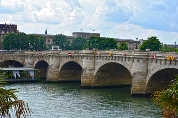 Fototapeta premium PARIS, FRANCE - MAY 25, 2019: bridge Pont Neuf, the oldest standing bridge across the river Seine in Paris, France