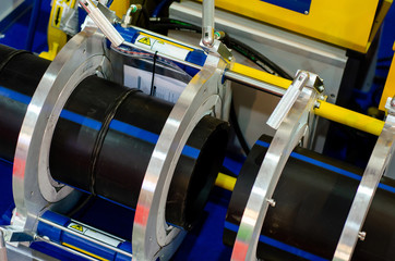 Device of butt welding of the polymeric pipes.