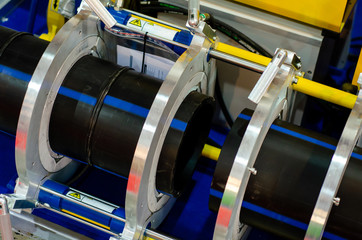 Device of butt welding of the polymeric pipes.