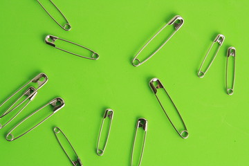 sewing pin on colorful background