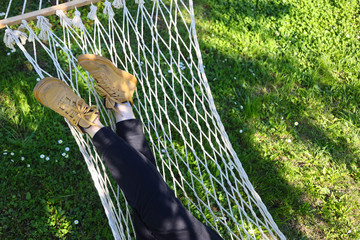 relaxing in hammock on beautiful spring day
