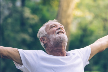Caucasian Elderly man being happy with freedom life after retirement