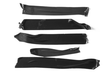 Set of black tapes on white background. Torn horizontal and different size black sticky tape,...