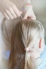 woman hand children girl hairstyle 