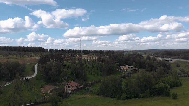 Aerial footage over a classica European housing estate, homes from above. Aerial shot over the top of housing estate. Aerial view over the village 4K