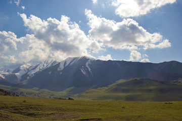 Fototapeta premium Mountain landscapes of Kyrgyzstan. Spring in the mountains.