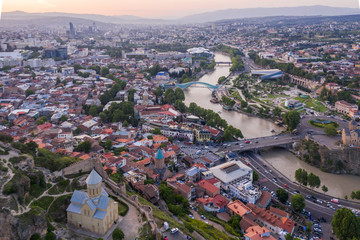 Fototapeta premium Aerial view of Church and Narikala Fortress in Tbilisi. Georgia.