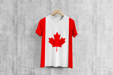 Canada flag T-shirt on hanger, Canadian team uniform design idea for garment production. National...