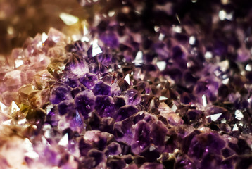 natural background - cluster of violet amethyst crystals