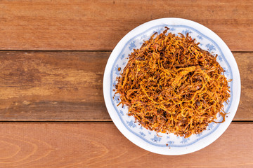 Serunding, dried meat floss made of beef or chicken