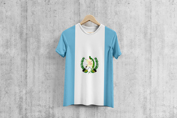 Guatemala flag T-shirt on hanger, Guatemalan team uniform design idea for garment production. National wear.