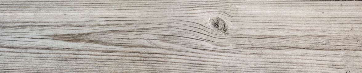 texture of antique floorboards, old dried wood with a lot of cracks and peeling fibers, closeup abstract background