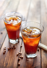 Tasty appetizing refreshing cold coffee with ice in glasses.