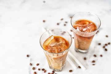 Top view of two glasses with iced cappuccino