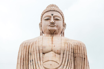 Daibutsu, The Great Buddha Statue in meditation pose or Dhyana Mudra seated on a lotus in open air near Mahabodhi Temple at Bodh Gaya, Bihar, India