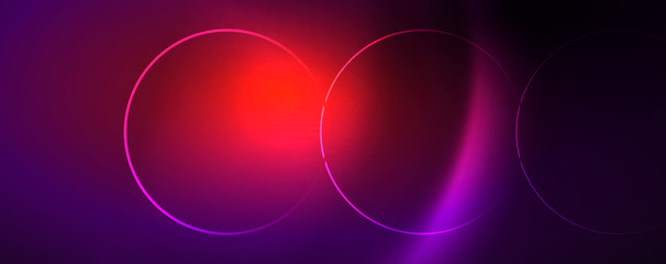 Shiny neon lights, dark abstract background with blurred magic neon light curved lines