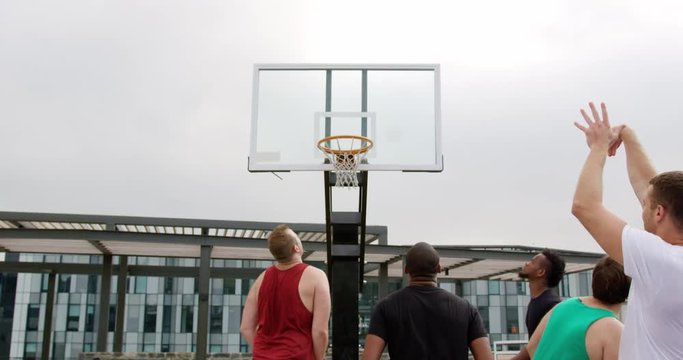 Basketball players playing basketball
