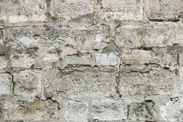 Old grey stone wall background texture