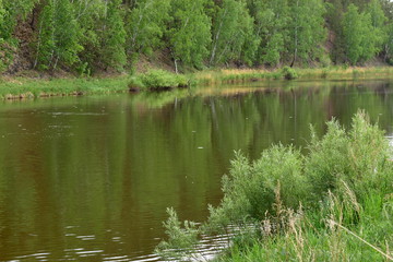 River flowing near the mountain.