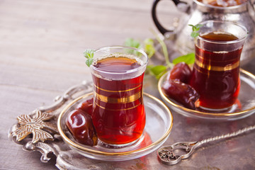 Turkish tea in traditional glass cups on the tray