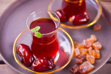 Turkish tea in traditional glass cups on the tray