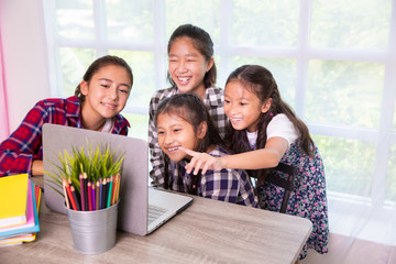 Student girls enjoy studying and learning from computer notebook pc, Back to school concept