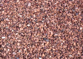 Red marble chips texture For use in landscape design, and decoration in floristics