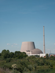 the shut down nuclear power plant of Mulheim-Karlich, Germany, with the partially demolished cooling tower of the closed down