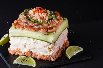 Piece of traditional savory swedish sandwich cake Smorgastorta